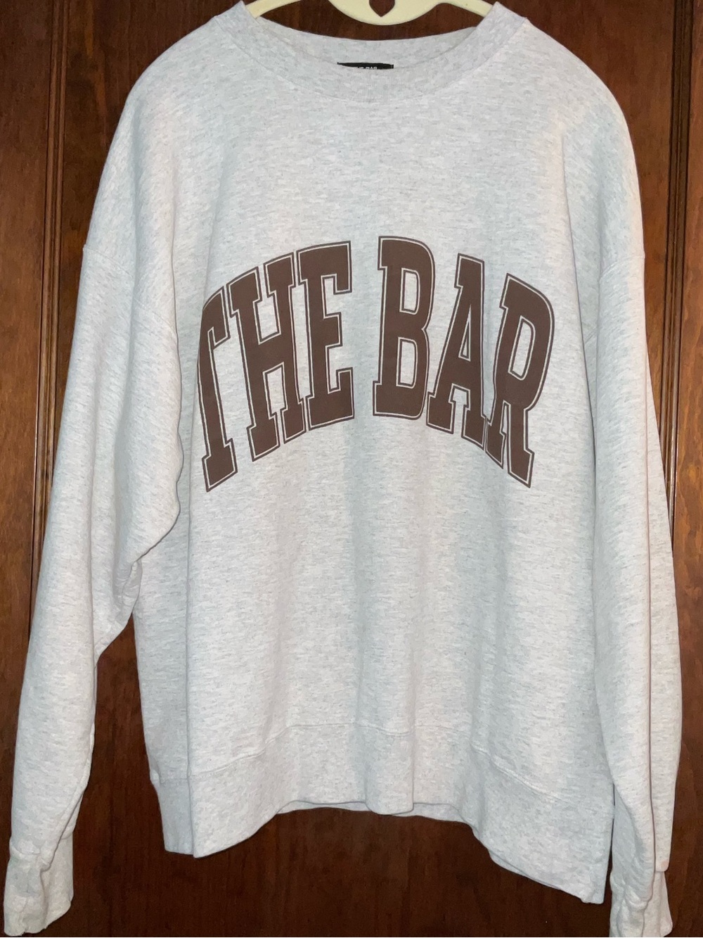 The Bar Light Gray Crewneck Sweatshirt with Brown Logo